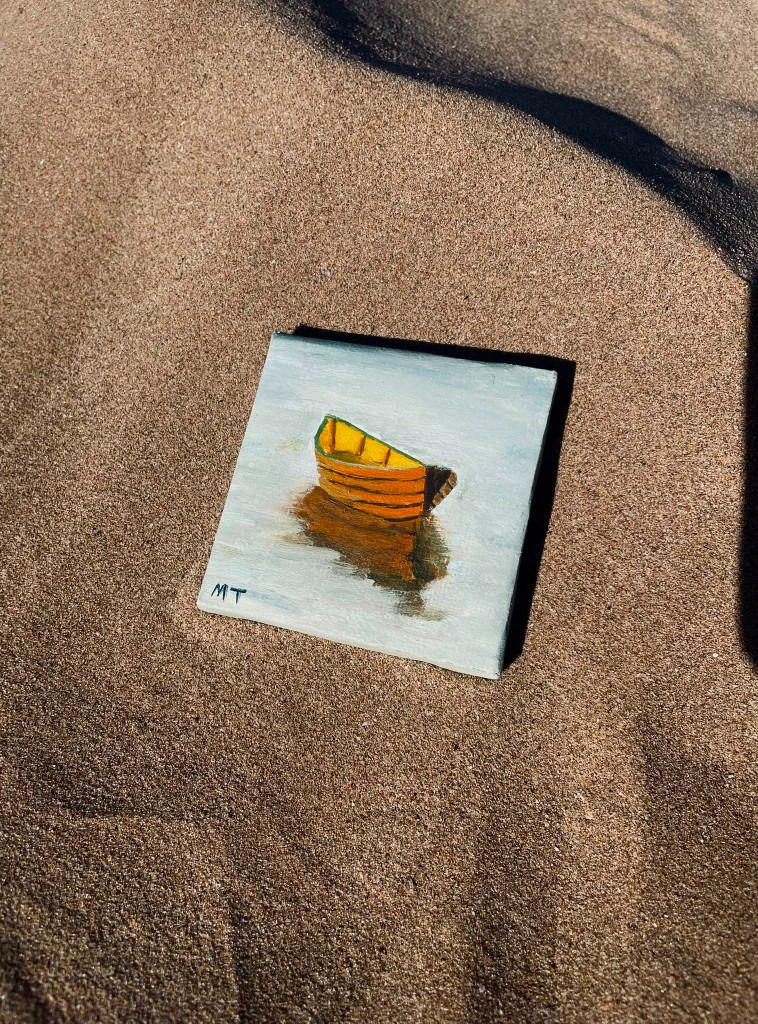 Obra de Meli Tozzi — bote en la arena